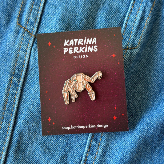 Rocky Pin on a card with 'Katrina Perkins Design' branding, placed on blue denim fabric.