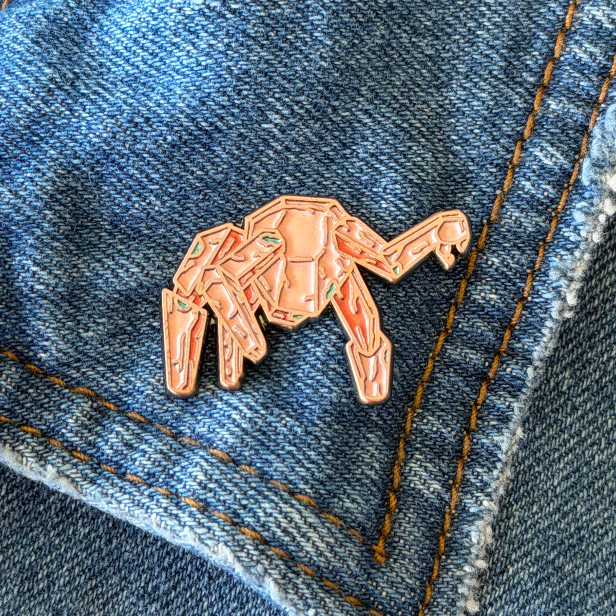 rocky pin on lapel of denim jacket